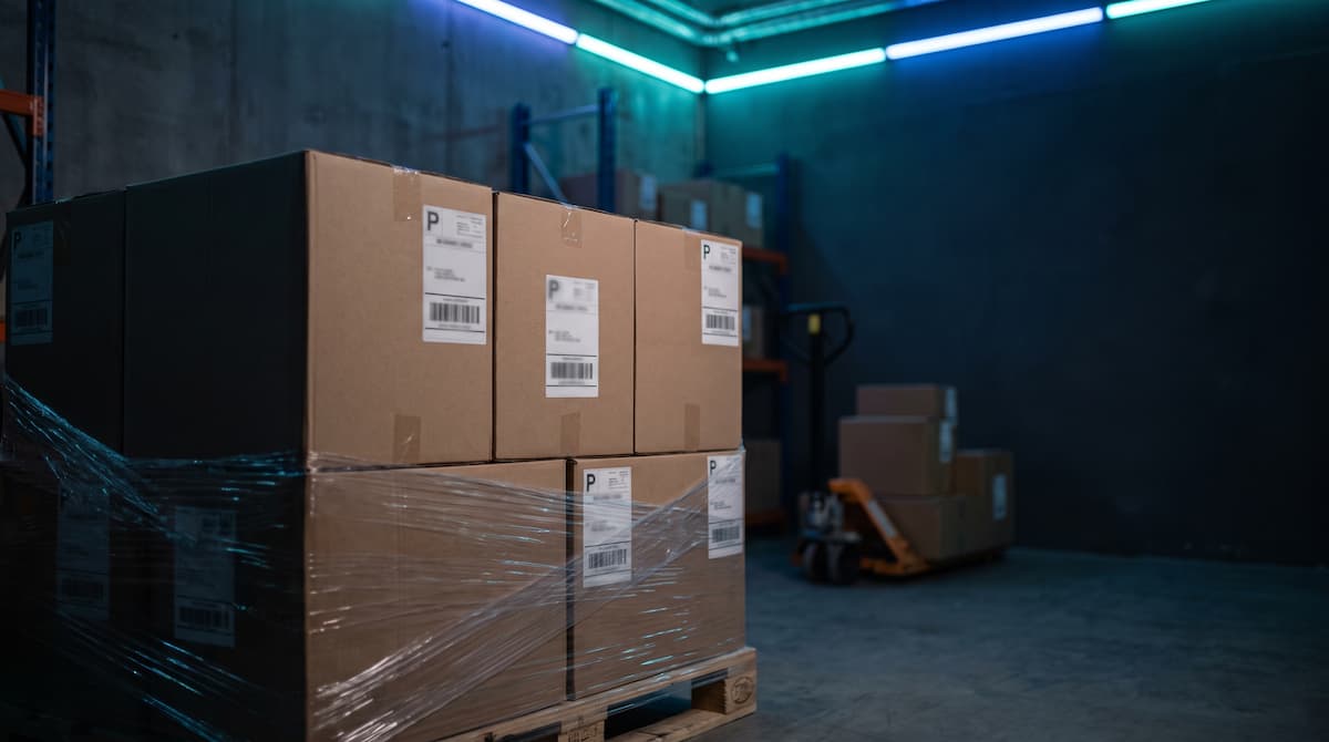 Refurbished laptops boxed and palletized for outbound freight